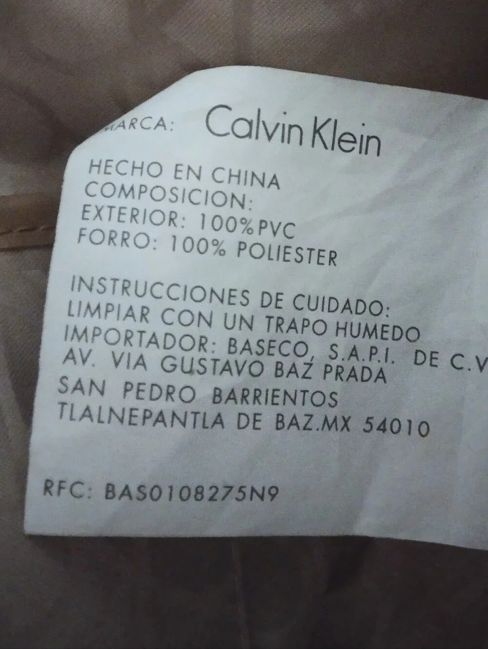 Calvin Klein Monogram Drawstring Backpack in Beige and Brown